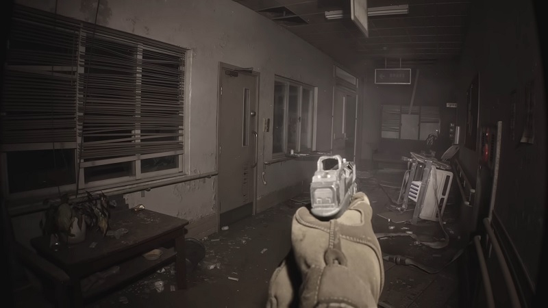 Lost Fragment: A hand pointing a gun down a dimly lit corridor.