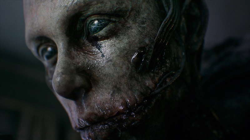 UNFOLLOW: A close-up of a scarred and horrifying face.